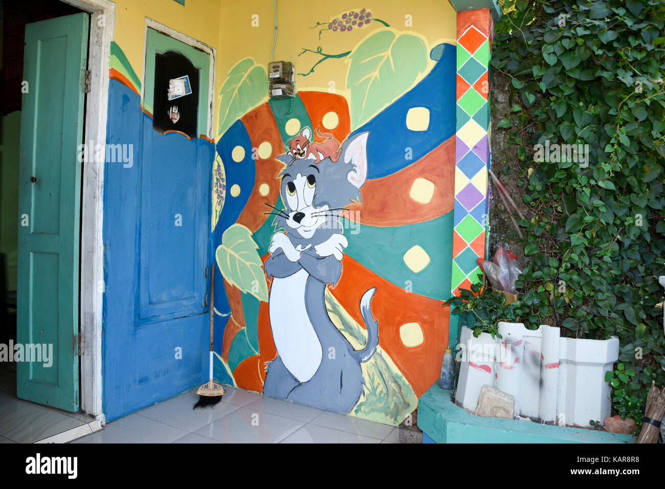 Comme Tom et Jerry une murale au rainbow village de Semerang, Indonésie Banque D'Images