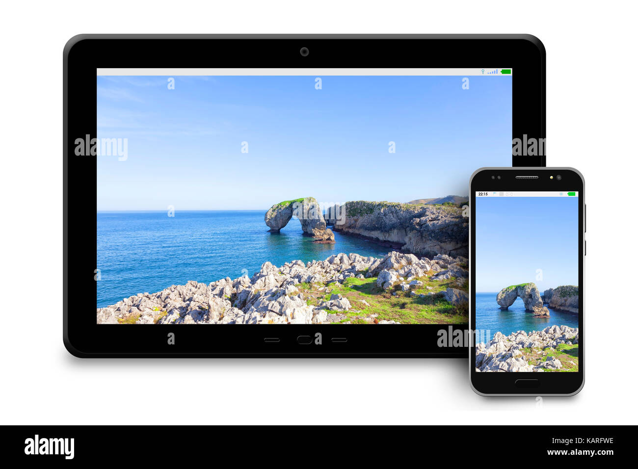 Modèles de téléphone et tablette avec des photographies de paysages maritimes sur fond blanc. Banque D'Images