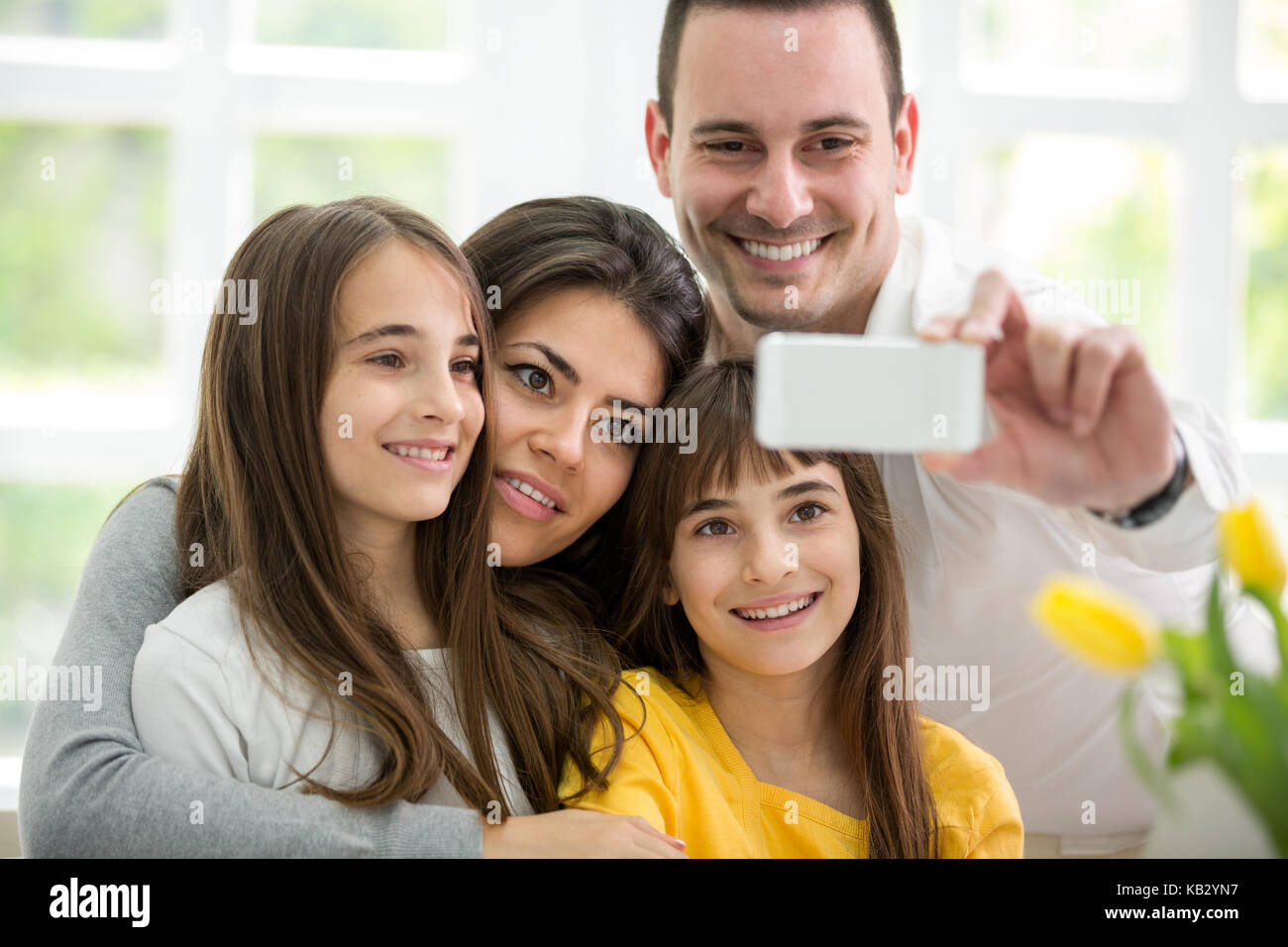 Self Portrait of happy young family Banque D'Images