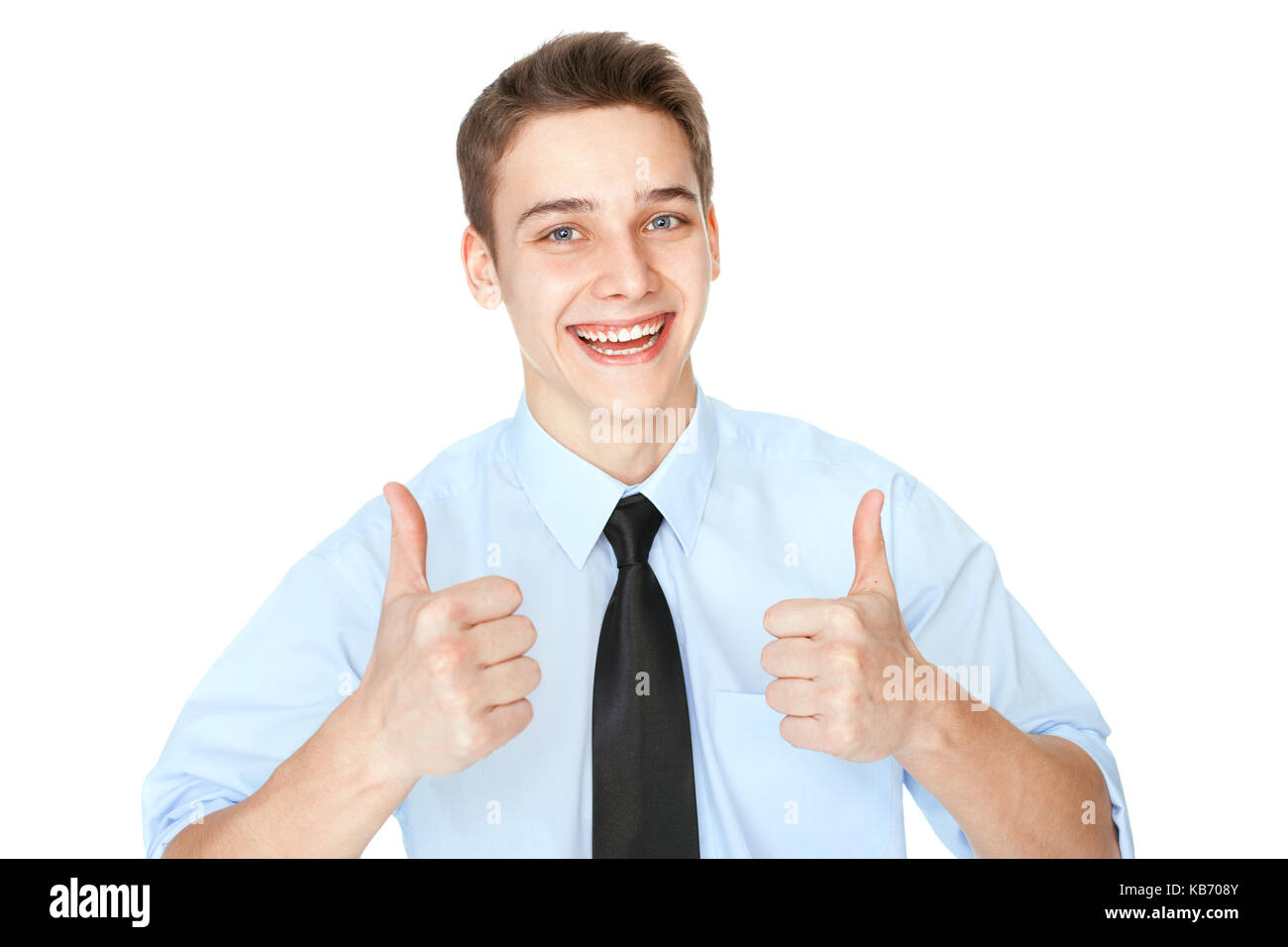 Portrait of young smiling successful businessman showing Thumbs up isolé sur fond blanc Banque D'Images