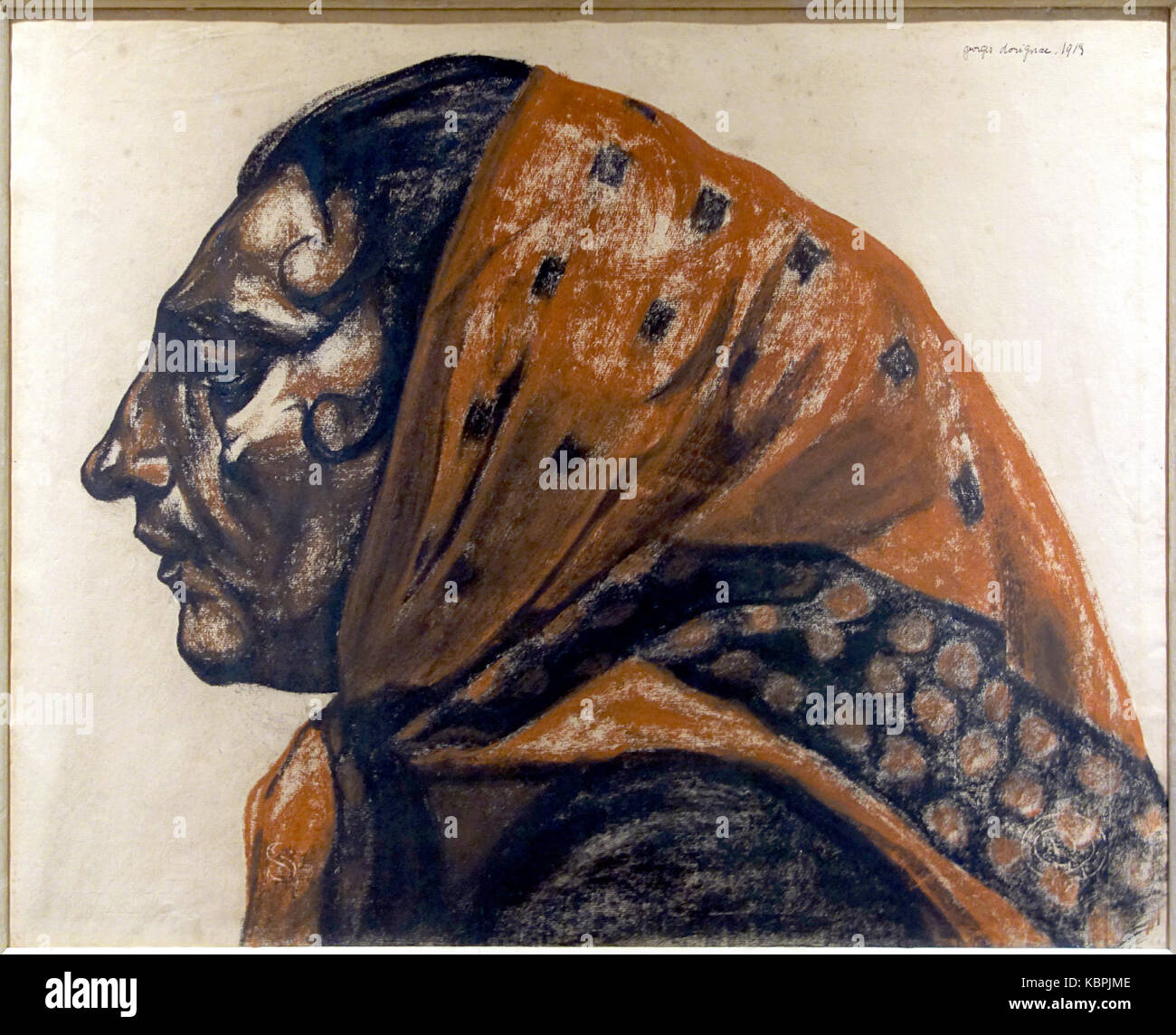 Une paysanne de la région de Dorignac, portant un fichu, un foulard traditionnel. Banque D'Images