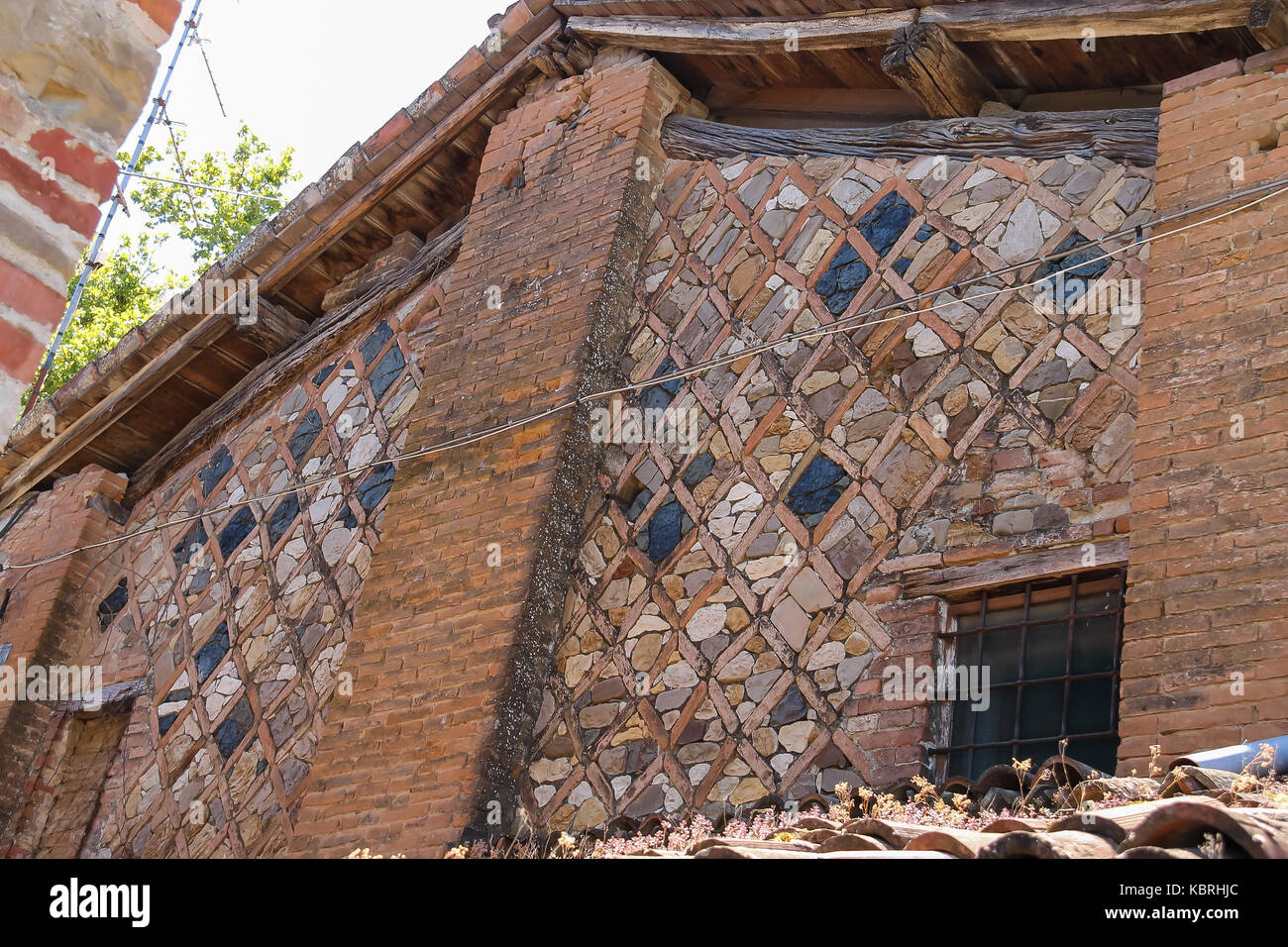 Mur de pierre de l'ancien bâtiment dans la ville médiévale de Grazzano Visconti castle, italie Banque D'Images