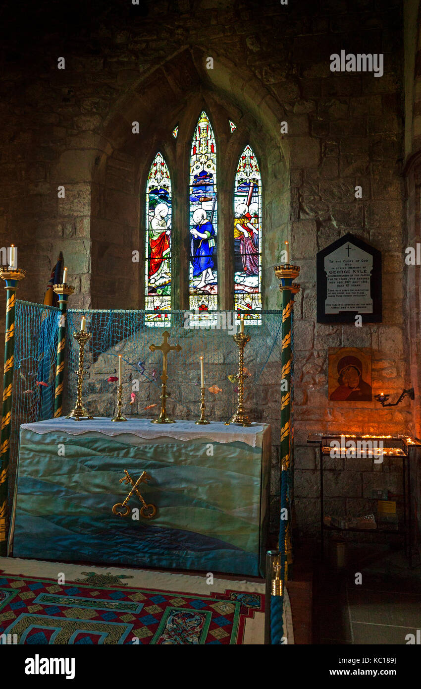 L'allée des pêcheurs 'avec st. Peter's altabiblr au 12ème siècle "Anglican Parish Church of Saint Mary the Virgin', Holy Island, dans le Northumberland. Banque D'Images