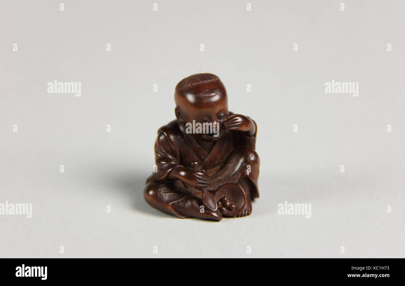 Netsuke, Japon, 19ème siècle, bois, H. 1 1/4 in. (3,2 cm), Netsuke Banque D'Images