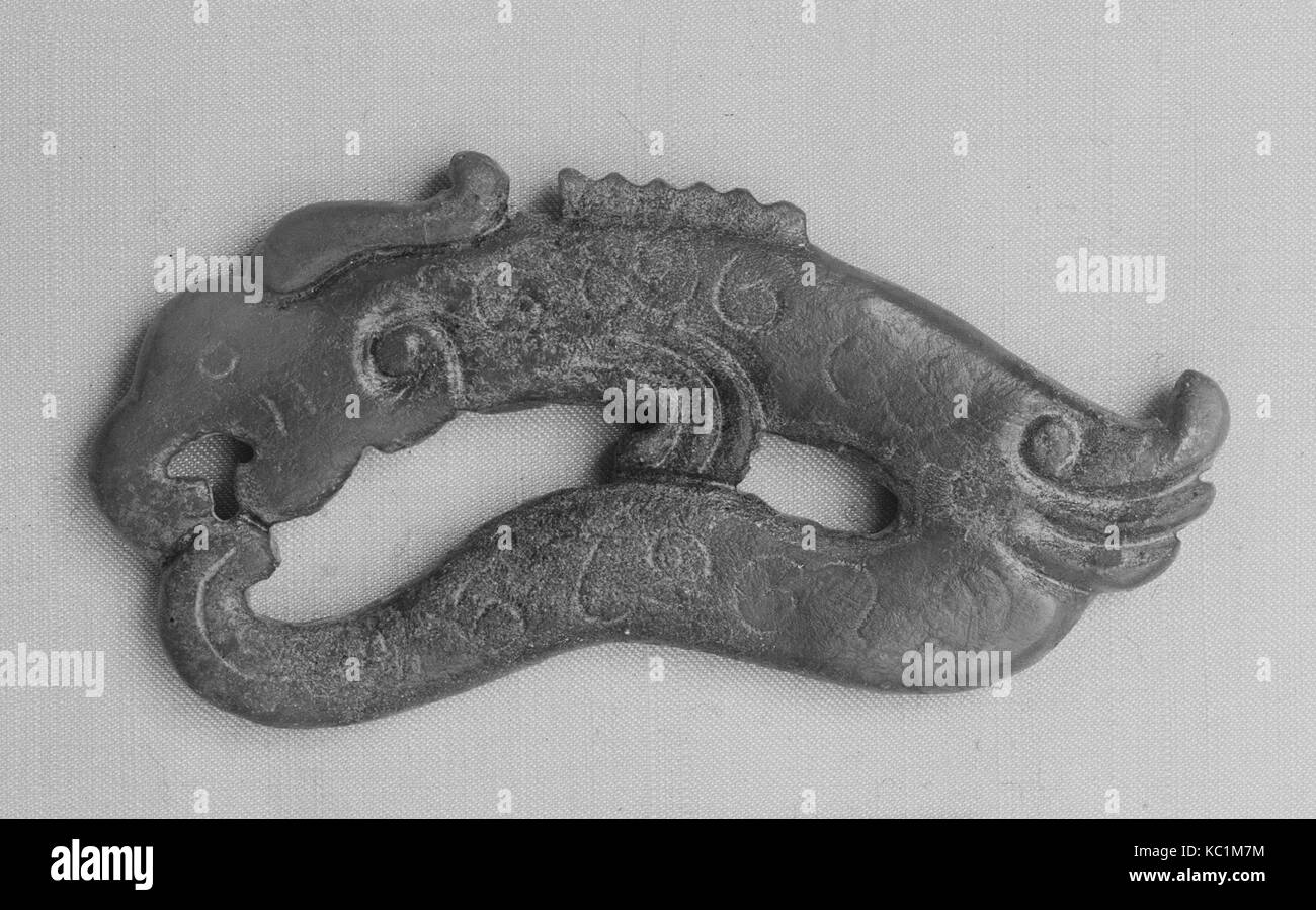 Poignée de ceinture, de la dynastie des Han (206 av. J.-A.D. 220), la Chine, le Jade, H. 1 3/8 in. (3,5 cm) ; W. 2 3/4 in. (7 cm) ; D. 3/16 in. (0,5 cm Banque D'Images