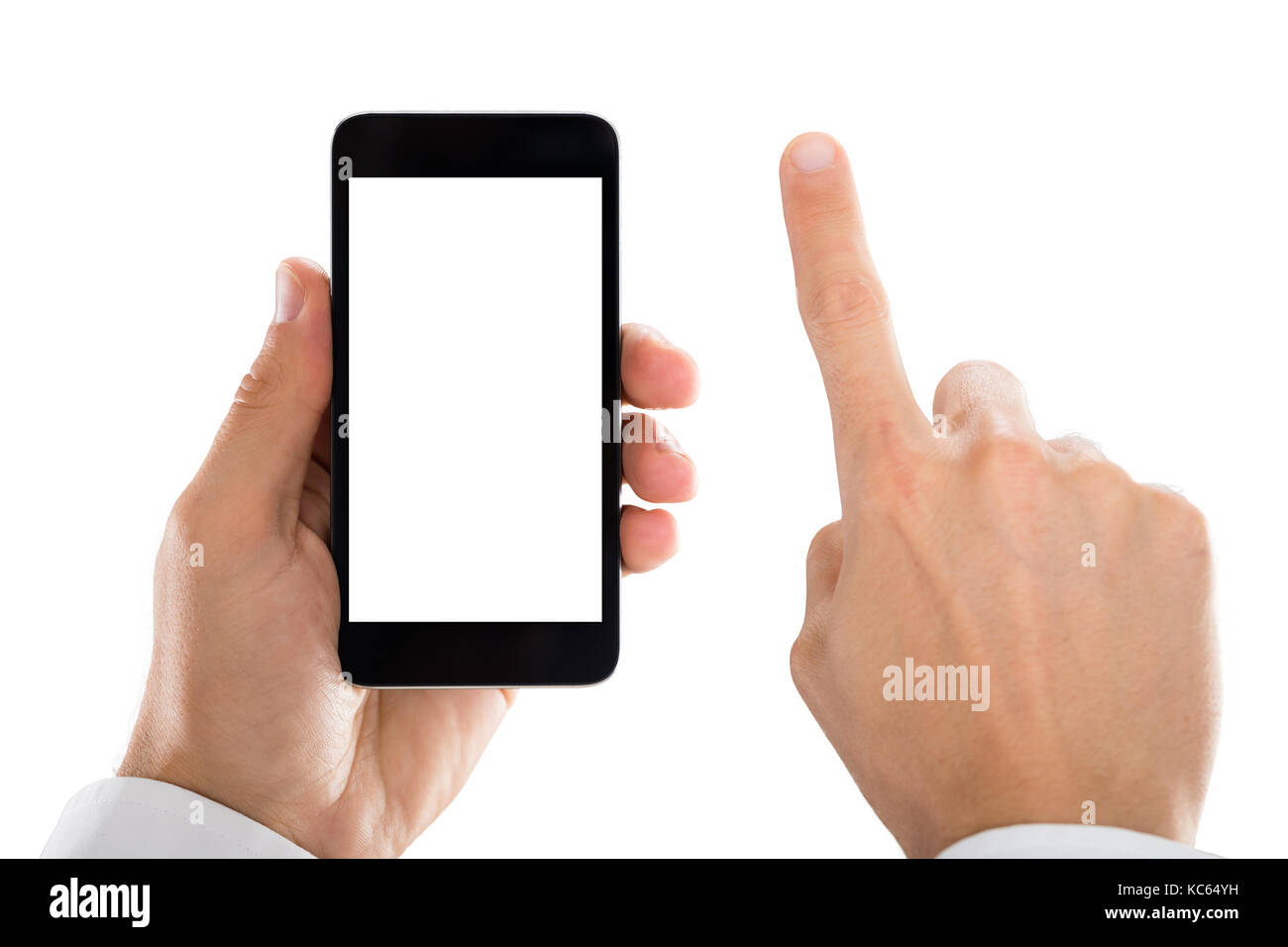 Close-up of man's hand holding mobile phone against white background Banque D'Images