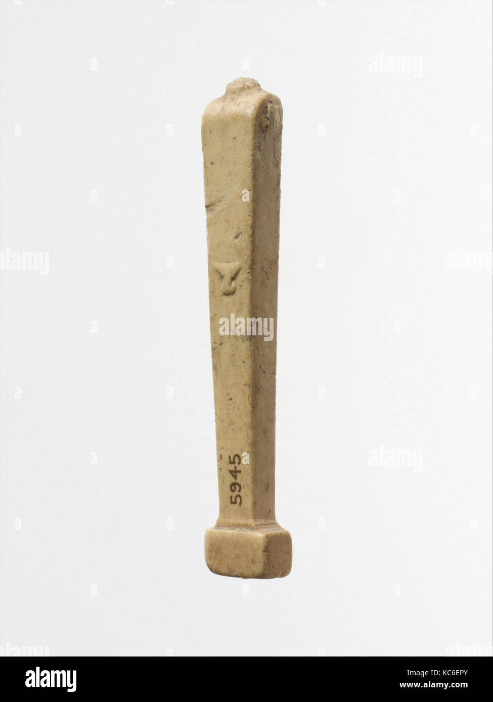 Objet d'os en forme de herm, 1er siècle A.D Banque D'Images
