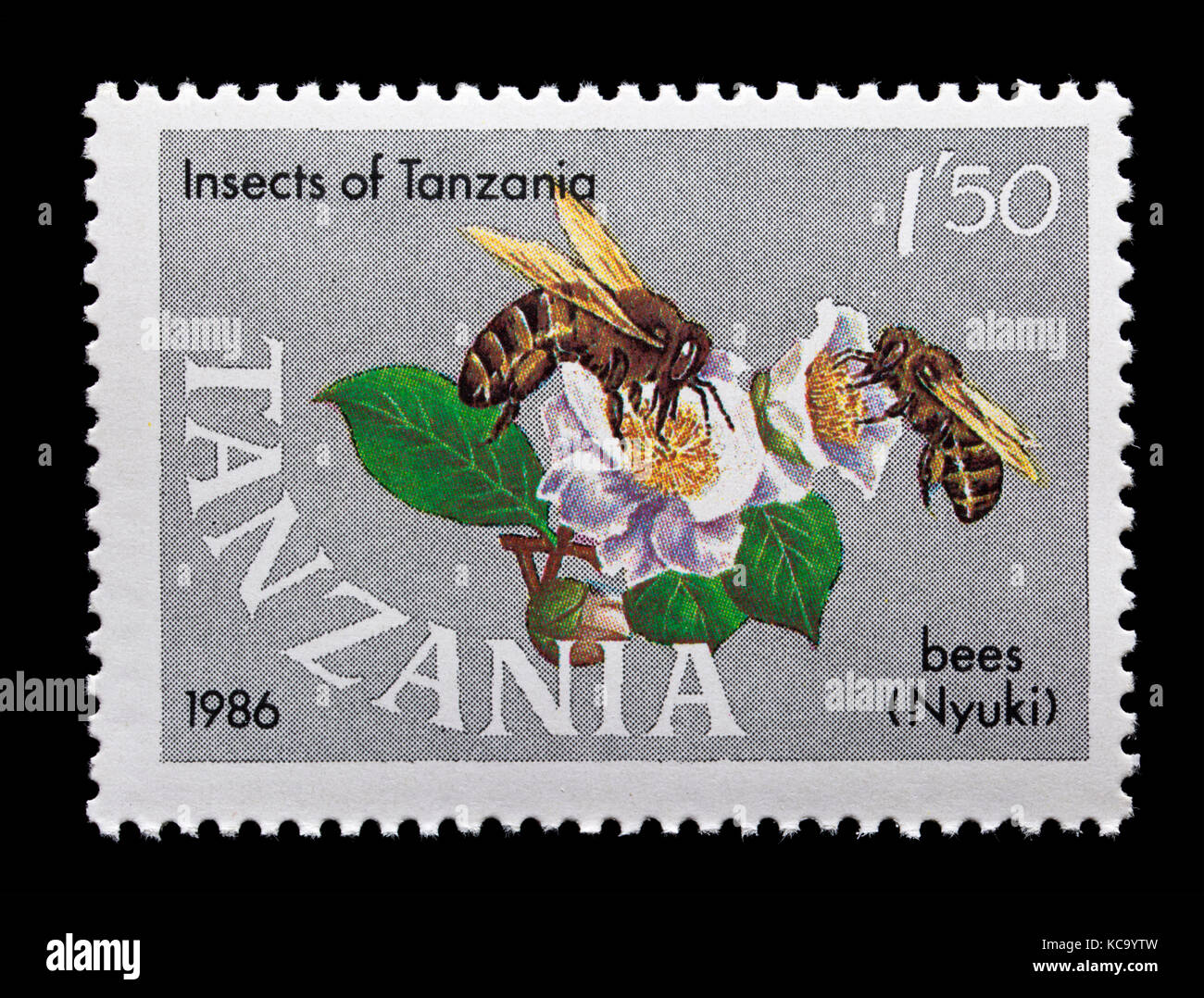 Timbre de Tanzanie illustrant les abeilles pollinisent une fleur Banque D'Images