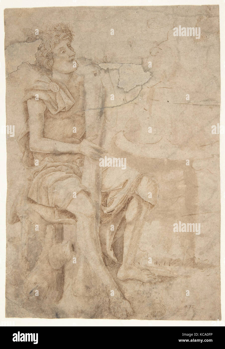 Homme assis tenant un club ou à un autre outil (recto) ; deux chefs de grotesque des hommes à profil (verso), cercle d'Andrea Mantegna Banque D'Images Homme assis tenant un club ou à un autre outil (recto) ; deux chefs de grotesque des hommes à profil (verso), cercle d'Andrea Mantegna Banque D'Images