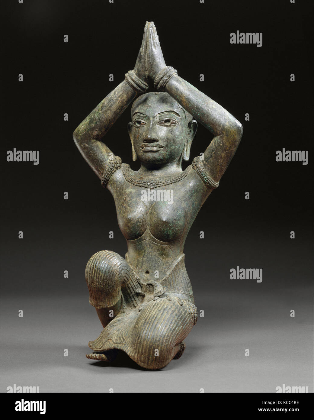 Femme agenouillée, période d'Angkor, le Khmer style du Baphuon, seconde moitié du 11e siècle, le Cambodge, bronze incrusté d'argent Banque D'Images