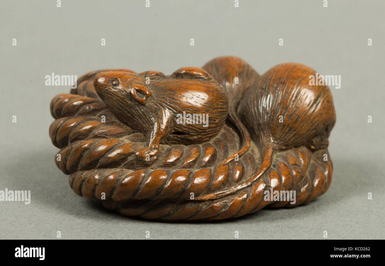 Netsuke de trois des souris sur une bobine de corde, 19e siècle Banque D'Images