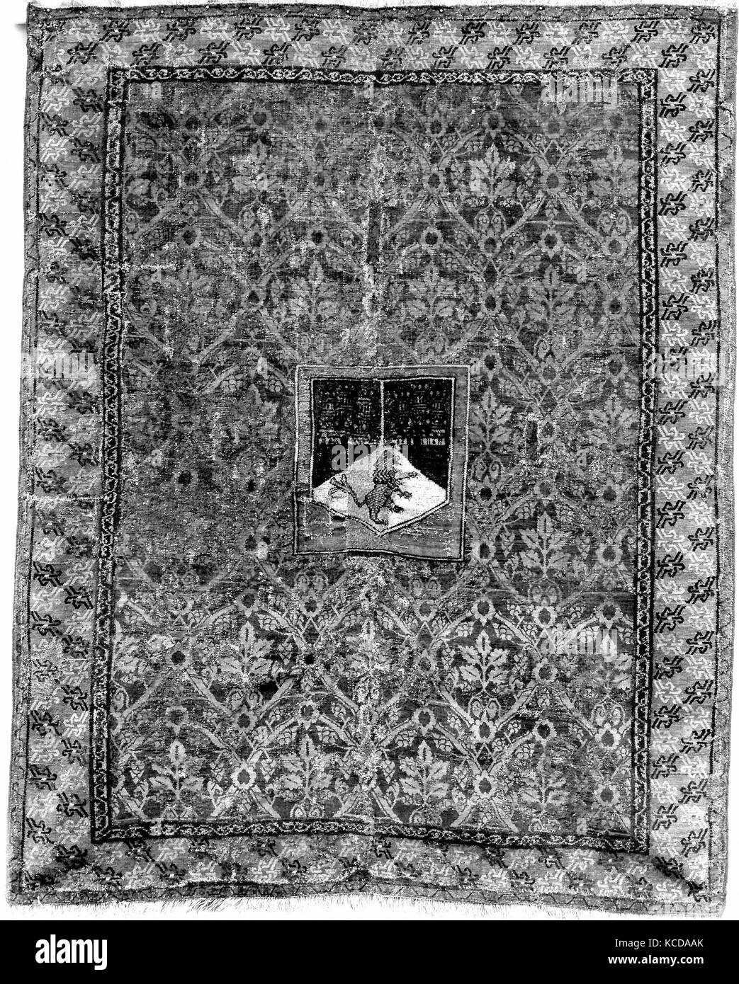 Tapis avec des armoiries, 15e-16e siècle, l'espagnol, de la laine, Total : 78 x 59 in. (198,1 x 149,9 cm), Textiles-Rugs Banque D'Images