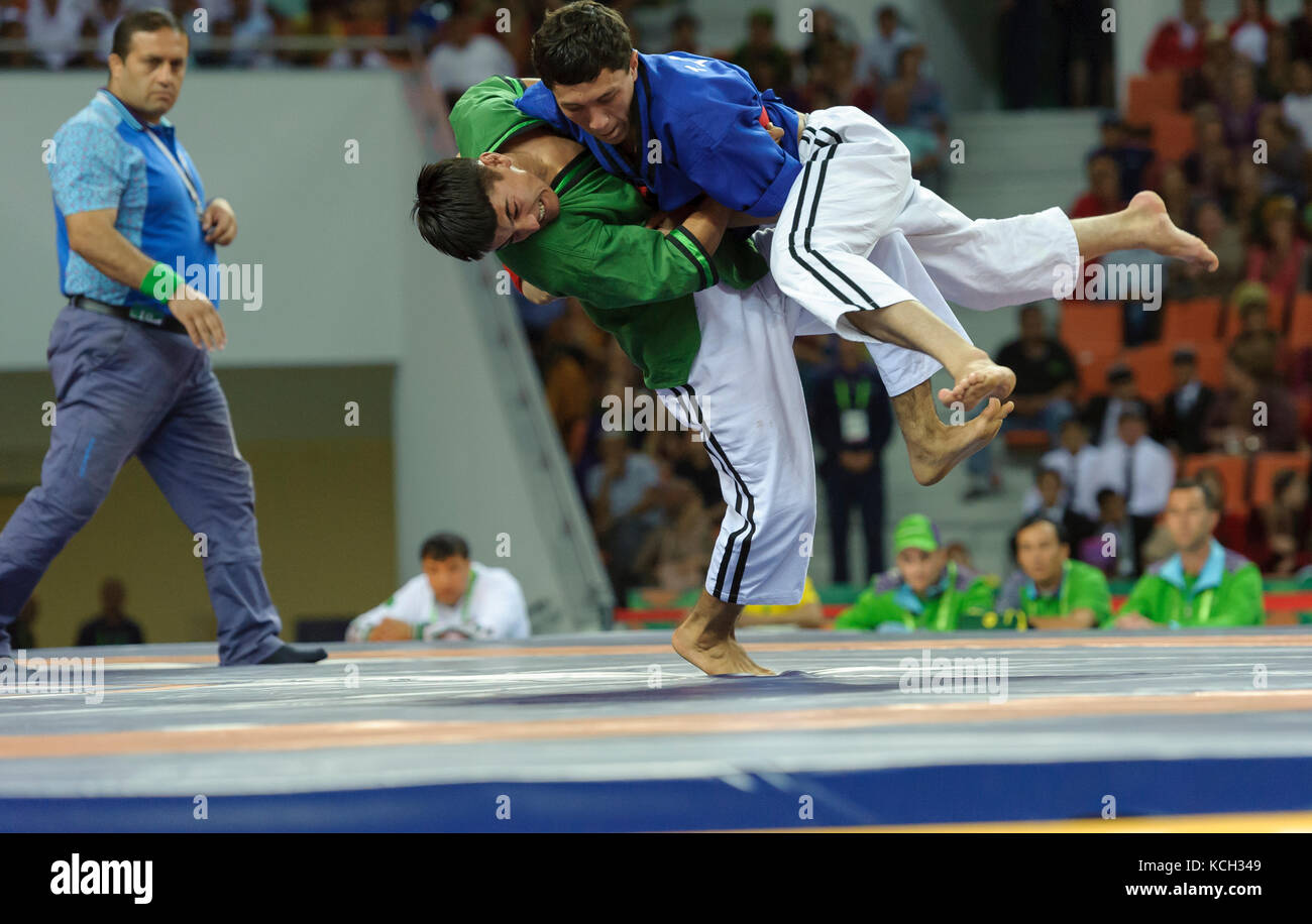 Turkménistan 2017 - 5e Jeux asiatiques Indoor & MartialArts 20-09-2017. Ayazow Beltwrestling - T. v (tkm) Mehrzod Sufiev (TJK) - Mens 60Kg Banque D'Images