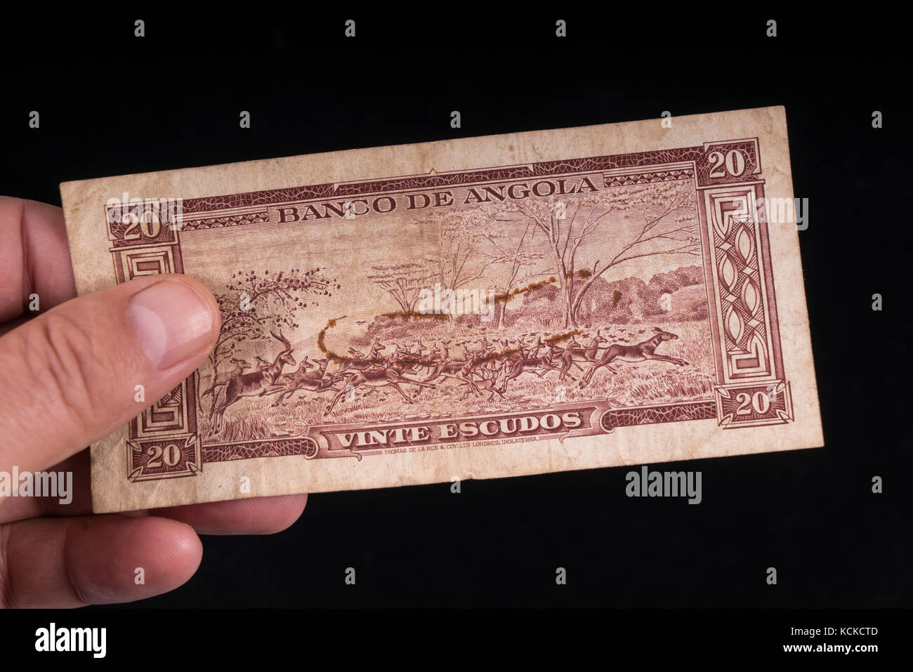 Un vieux billet de banque angolais Banque D'Images