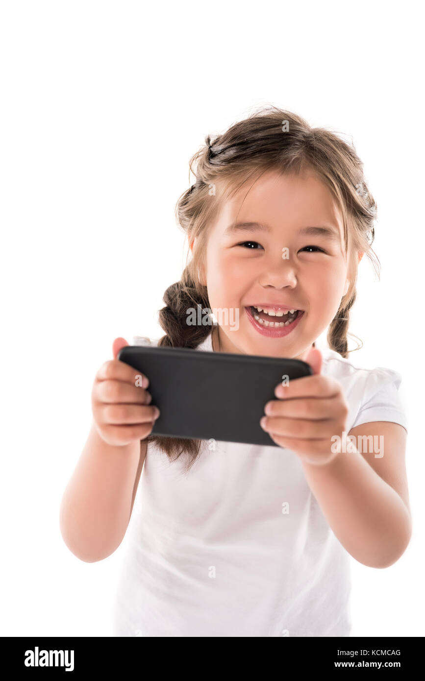 Enfant using smartphone Banque D'Images