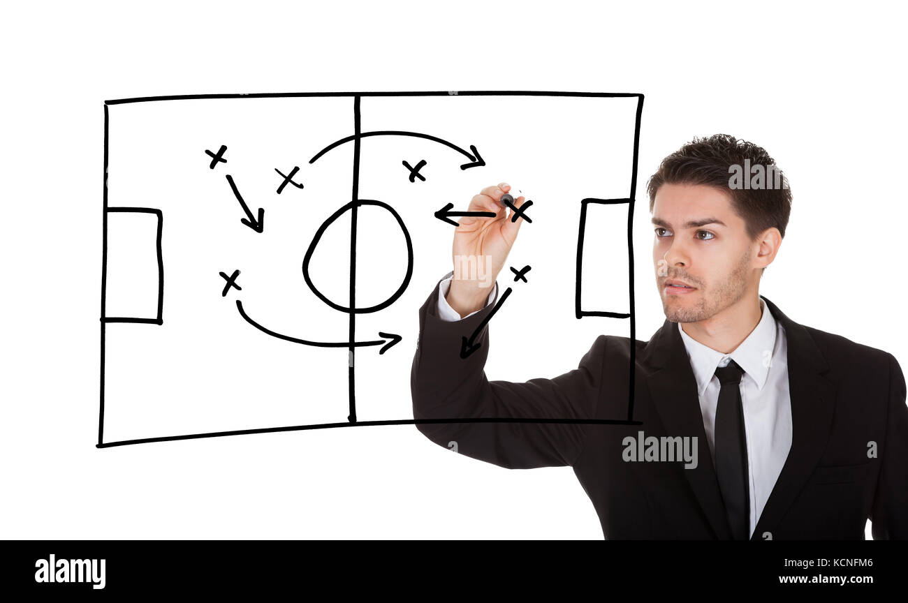 Stratégie de jeu football homme écrit sur écran blanc Banque D'Images