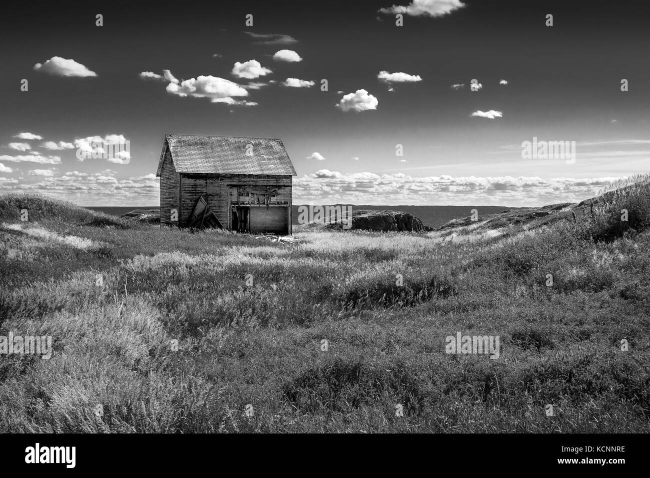 Patinées par le vent et l'eau salée, de l'ancienne résidence de la famille d'une famille de pêcheurs, Change Islands, Terre-Neuve et Labrador Banque D'Images