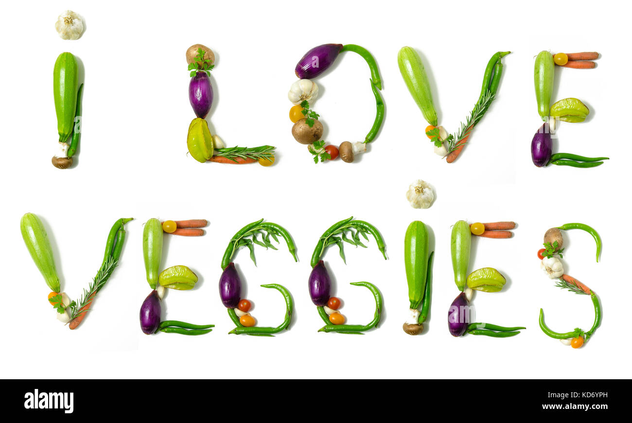 Phrase 'J'aime' légumes écrit avec des légumes comme un concept de style de vie sain, régime végétarien ou végétalien, la remise en forme ou la réduction de calories Banque D'Images
