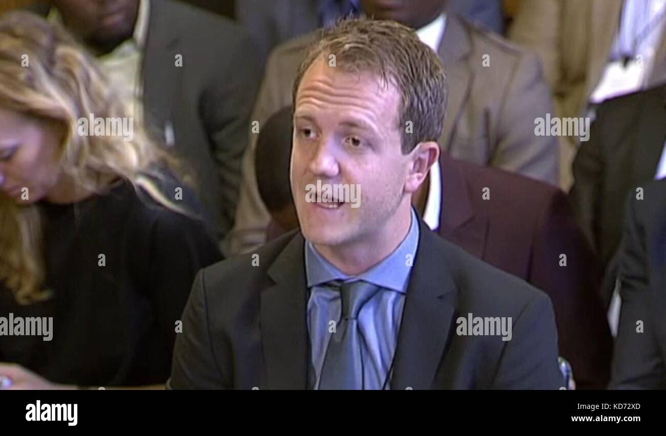 Au Royaume-Uni, Dan Warne, directeur général de Deliveroo, apporte des preuves au Business, Energy and Industrial Strategy Committee, au Palace of Westminster à Londres. Banque D'Images