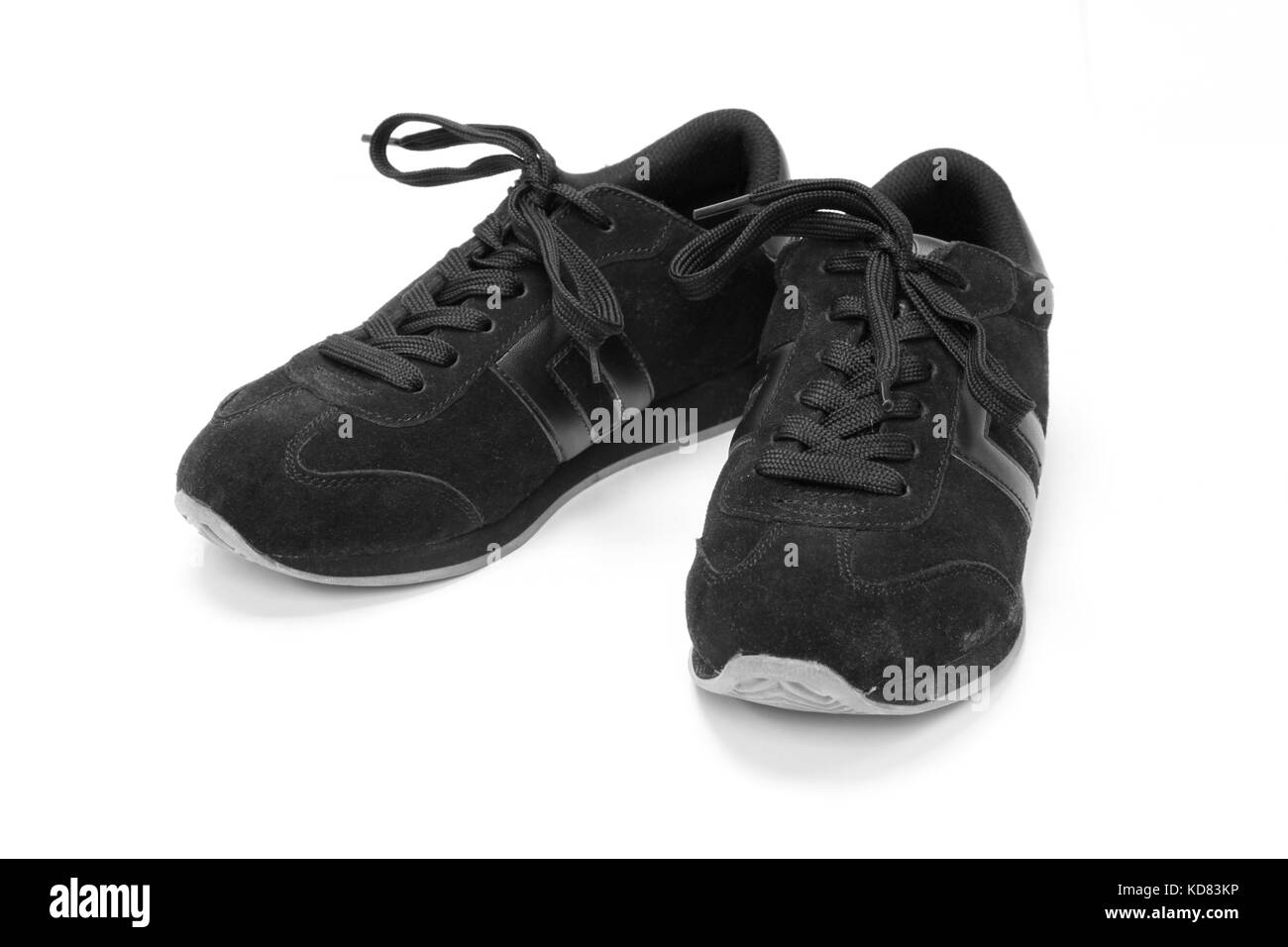 Chaussures de course noir sur fond blanc Banque D'Images