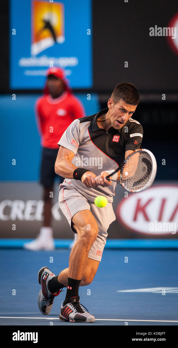 Novak Djokovic (SRB), monta contre indemnité lucas lacko (SVK) dans un jeu de l'Open d'Australie 2014 à Melbourne. djokovic bat lacko 6-3 Banque D'Images