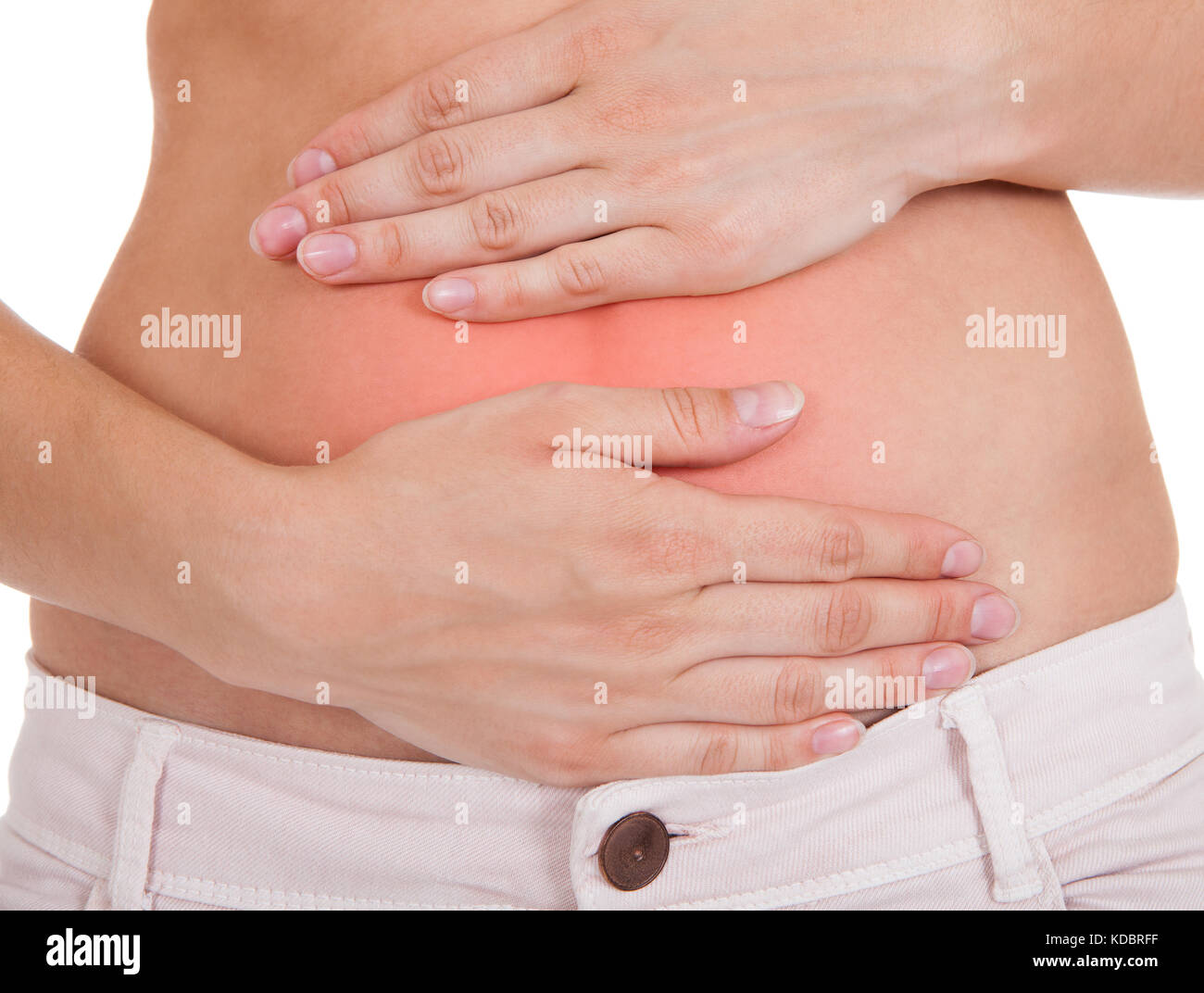 Close up of woman's hands on belly isolé sur fond blanc Banque D'Images