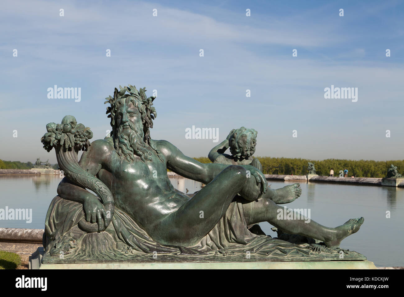 Statue en bronze de Neptune, jardins de Versailles, France. Banque D'Images