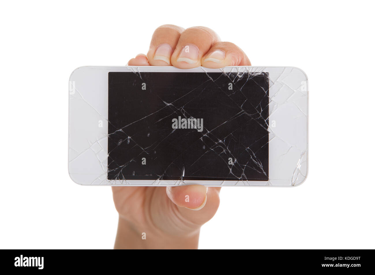 Hand holding Smartphone avec écran fissuré sur fond blanc Banque D'Images