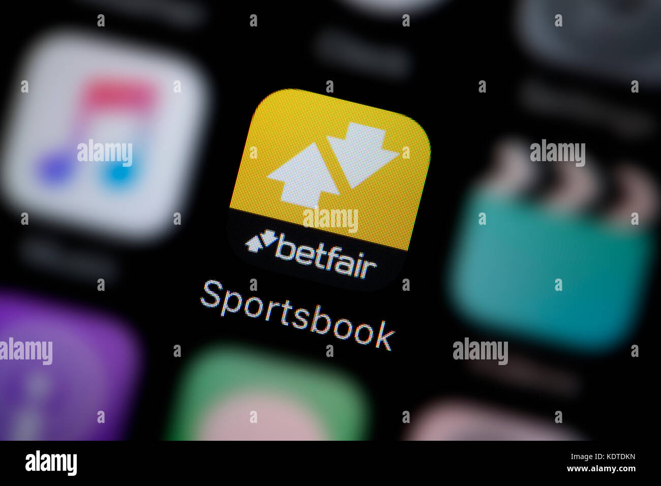 Un gros plan sur le logo représentant l'icône de l'application de Betfair, comme on le voit sur l'écran d'un téléphone intelligent (usage éditorial uniquement) Banque D'Images