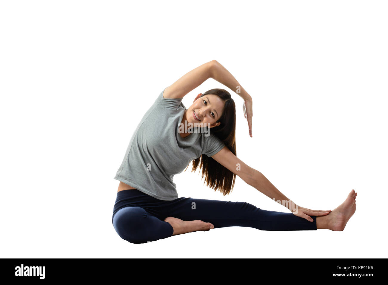 Young Asian woman practicing yoga, assis en pose facile , femme en bonne santé. concept de bonne hygiène de vie et de détente. man isolalted,studi Banque D'Images