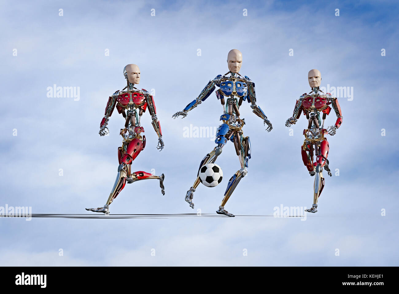 Robots jouant au football Banque D'Images