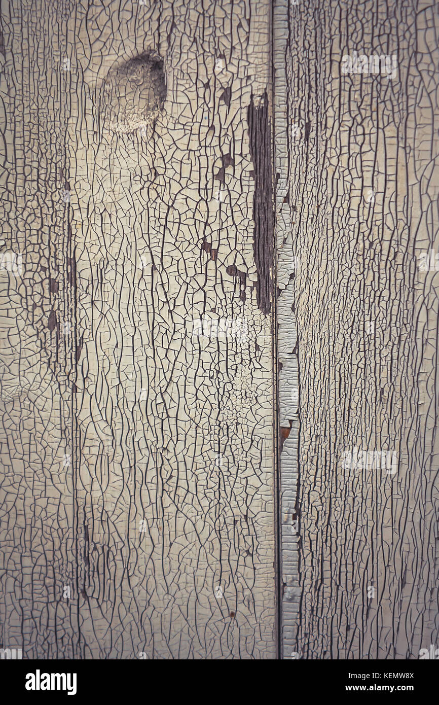 Vintage bois blanchie fond rustique avec des fissures sur l'ancienne surface en bois blanchi Banque D'Images