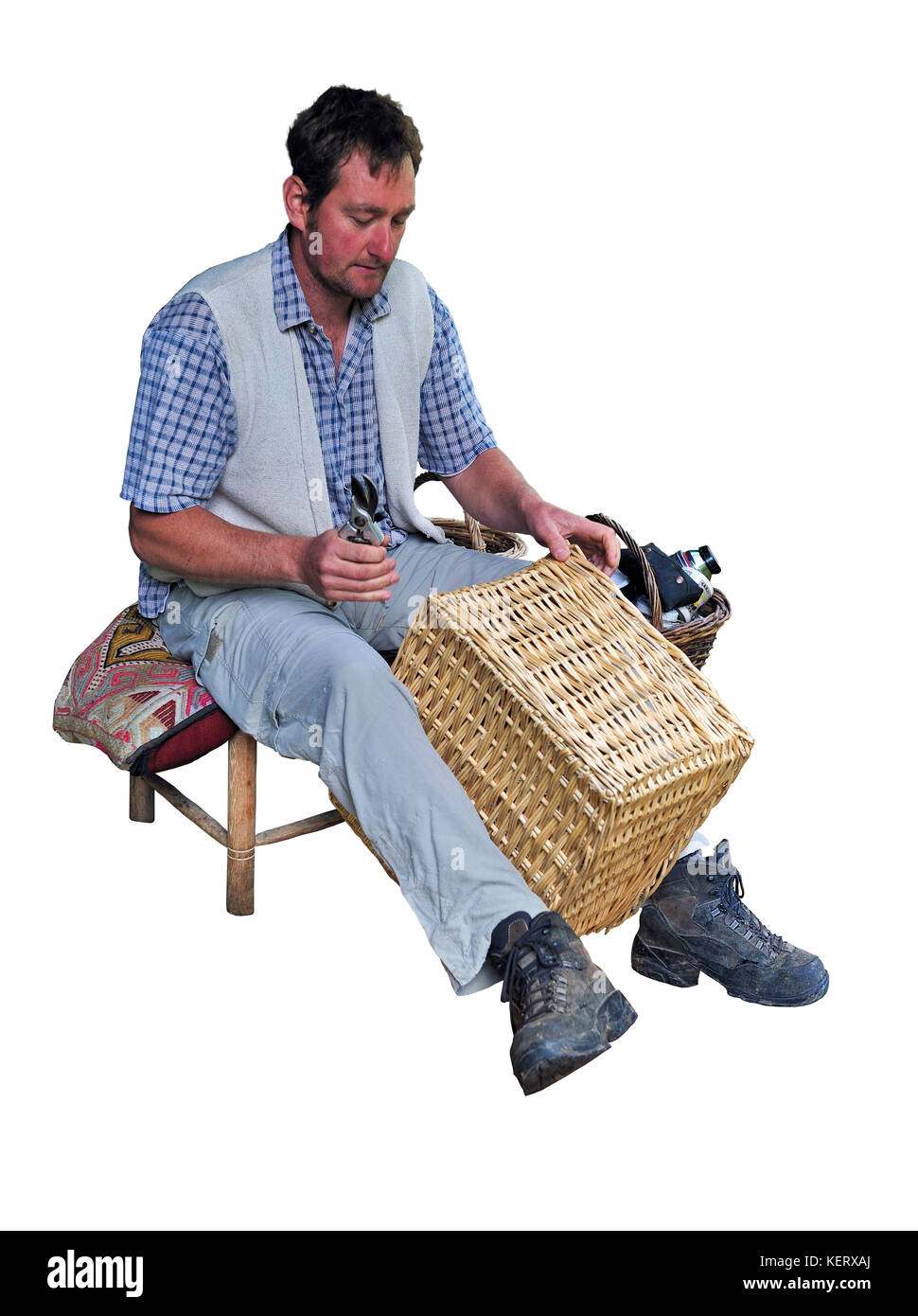 L'homme au stand d'artisanat vannerie Banque D'Images