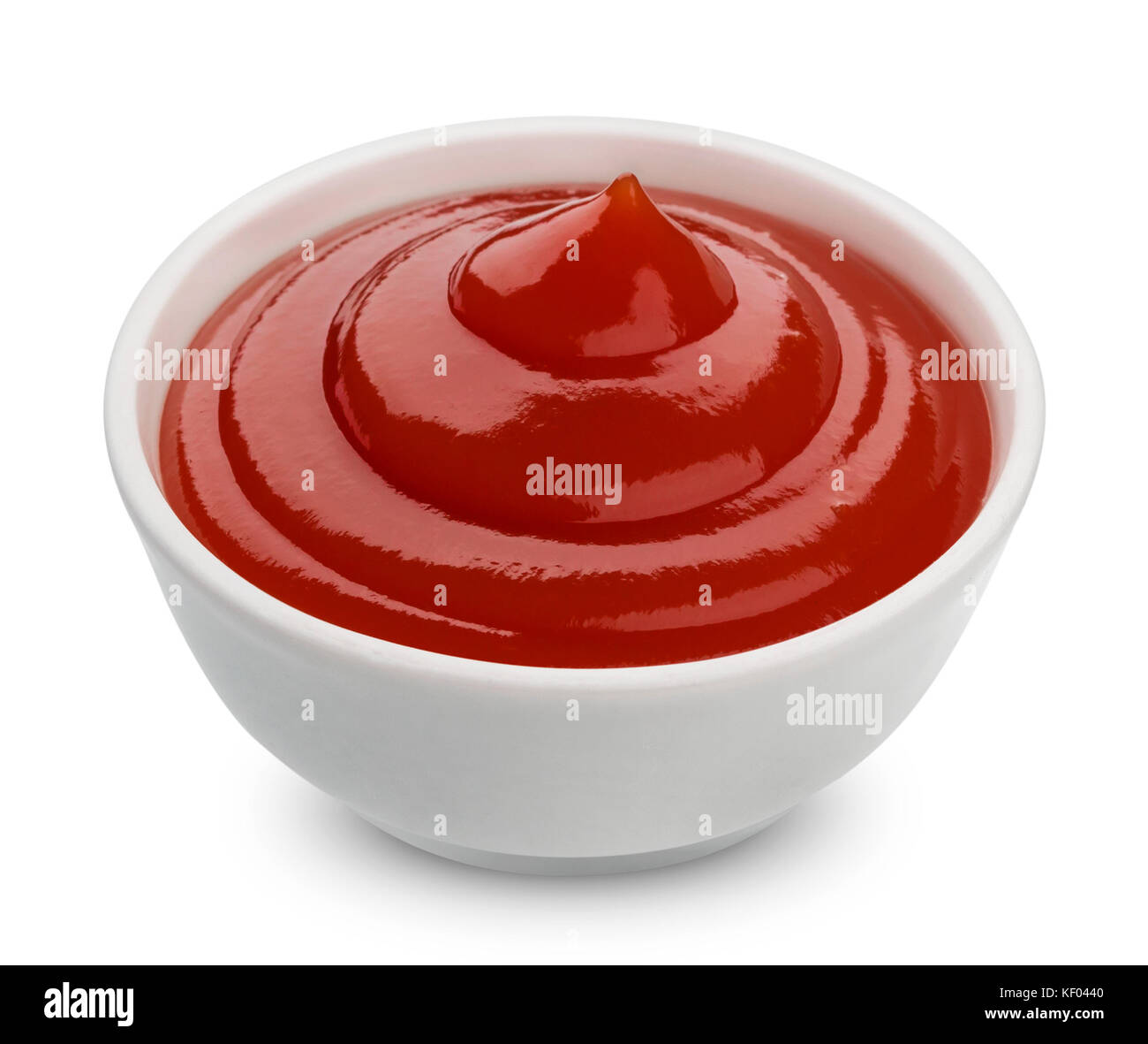 Bol de ketchup isolé sur fond blanc Banque D'Images