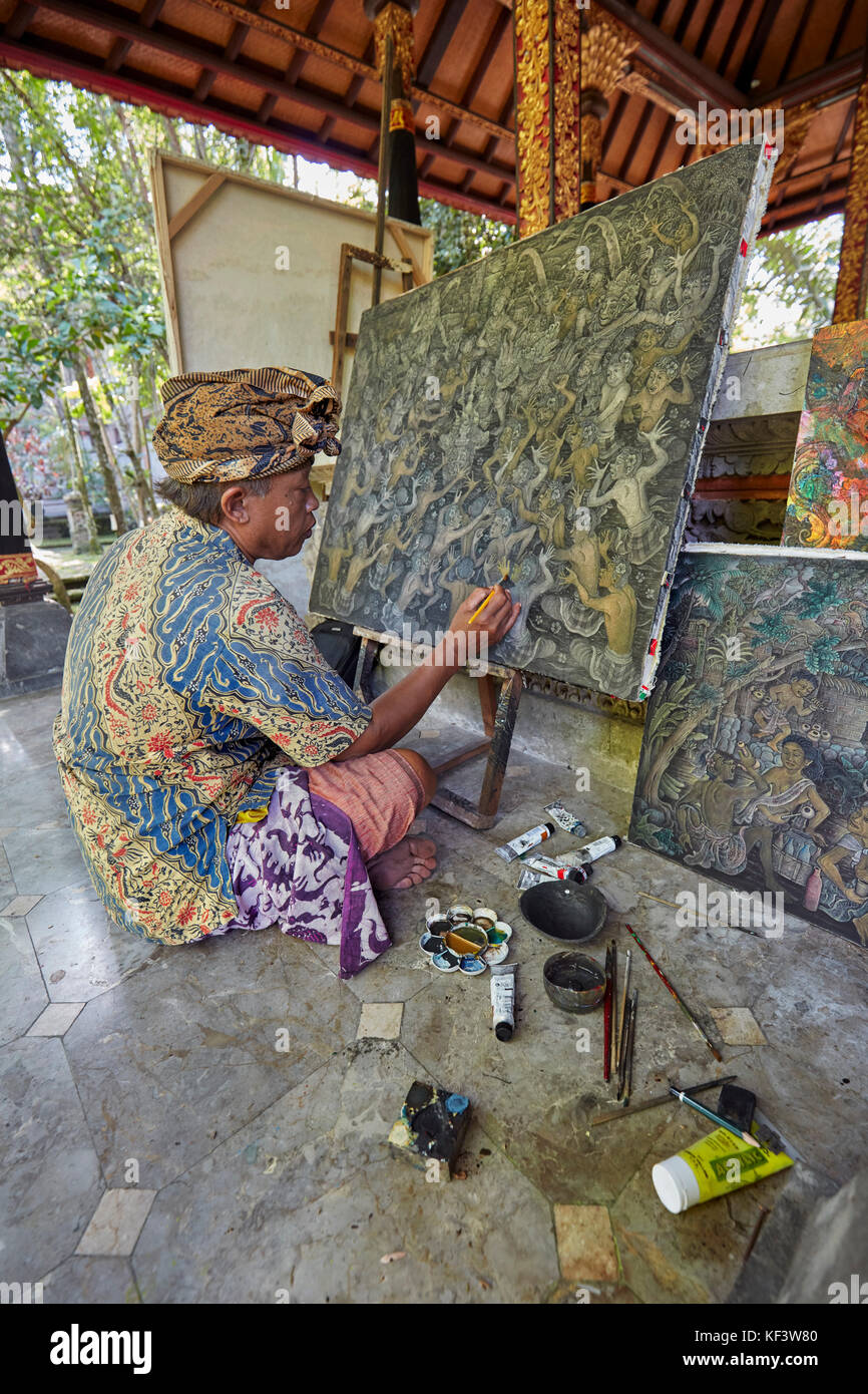 Artiste travaillant à l'agung Rai Museum of Art (ARMA). Ubud, Bali, Indonésie. Banque D'Images