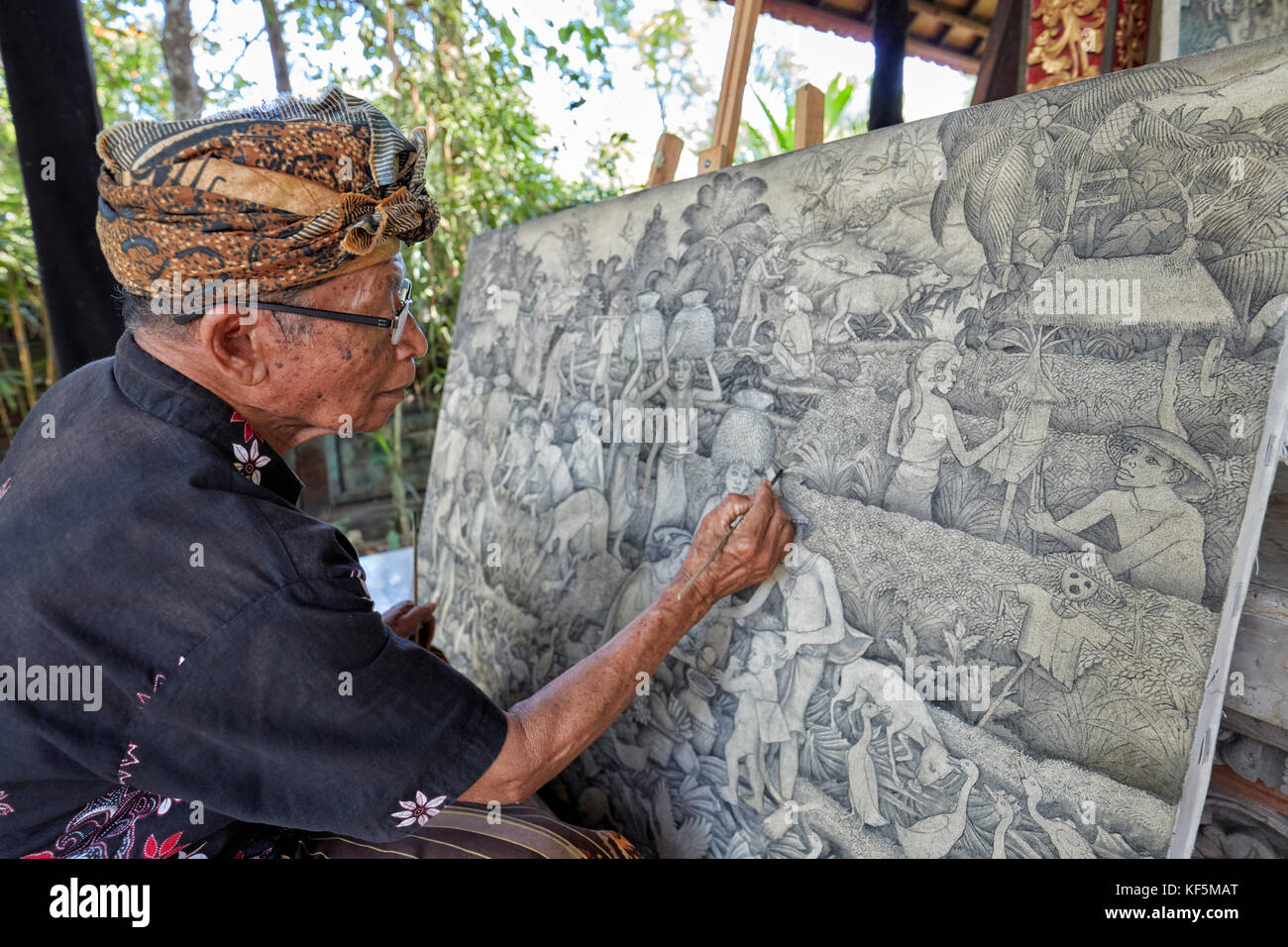Artiste travaillant à l'agung Rai Museum of Art (ARMA). Ubud, Bali, Indonésie. Banque D'Images