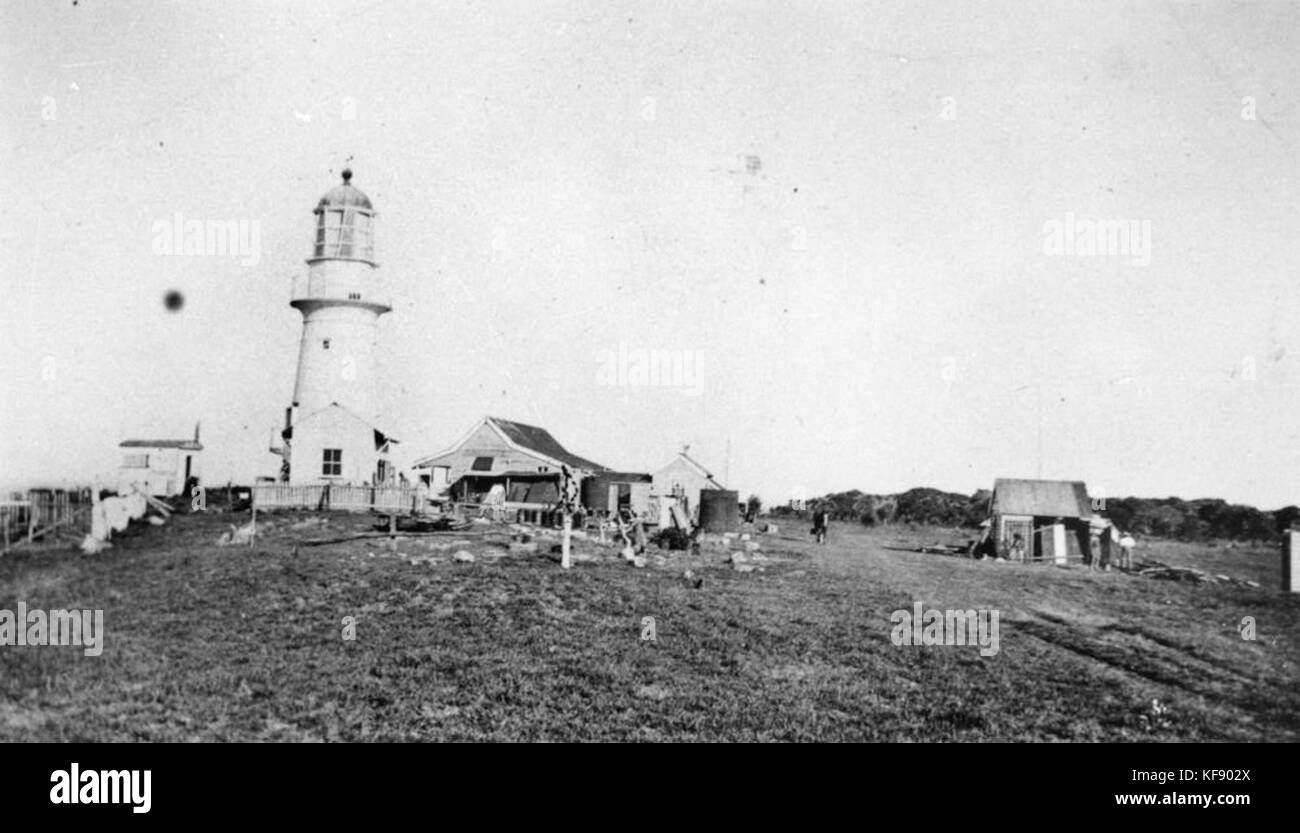 Outarde barbue Head Lighthouse and cottages, 1934 Banque D'Images
