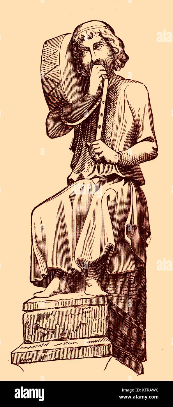 Timpanum d'une treizième siècle illustration de sculptures à Reims. Ici, le timbalier est également soufflant dans une flûte metla, fixé sur le tambour. Banque D'Images