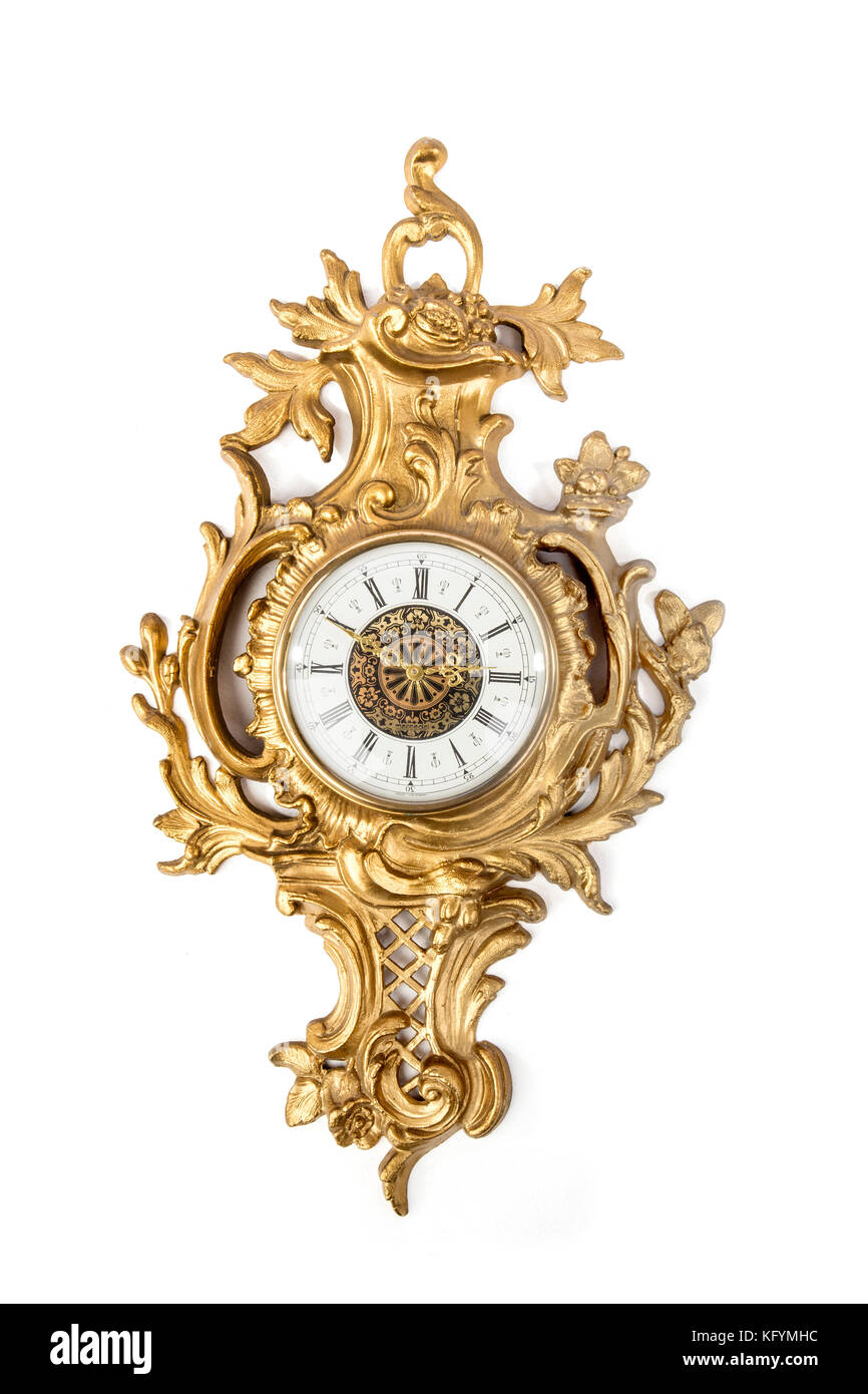 Horloge murale ancienne table d'or sur le fond blanc. Banque D'Images