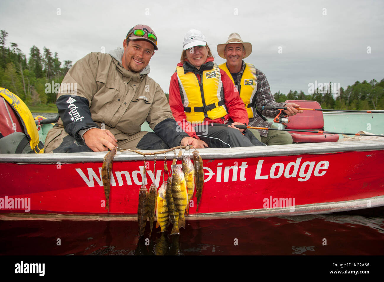 Pêche avec guide et deux perches de Stringer Banque D'Images