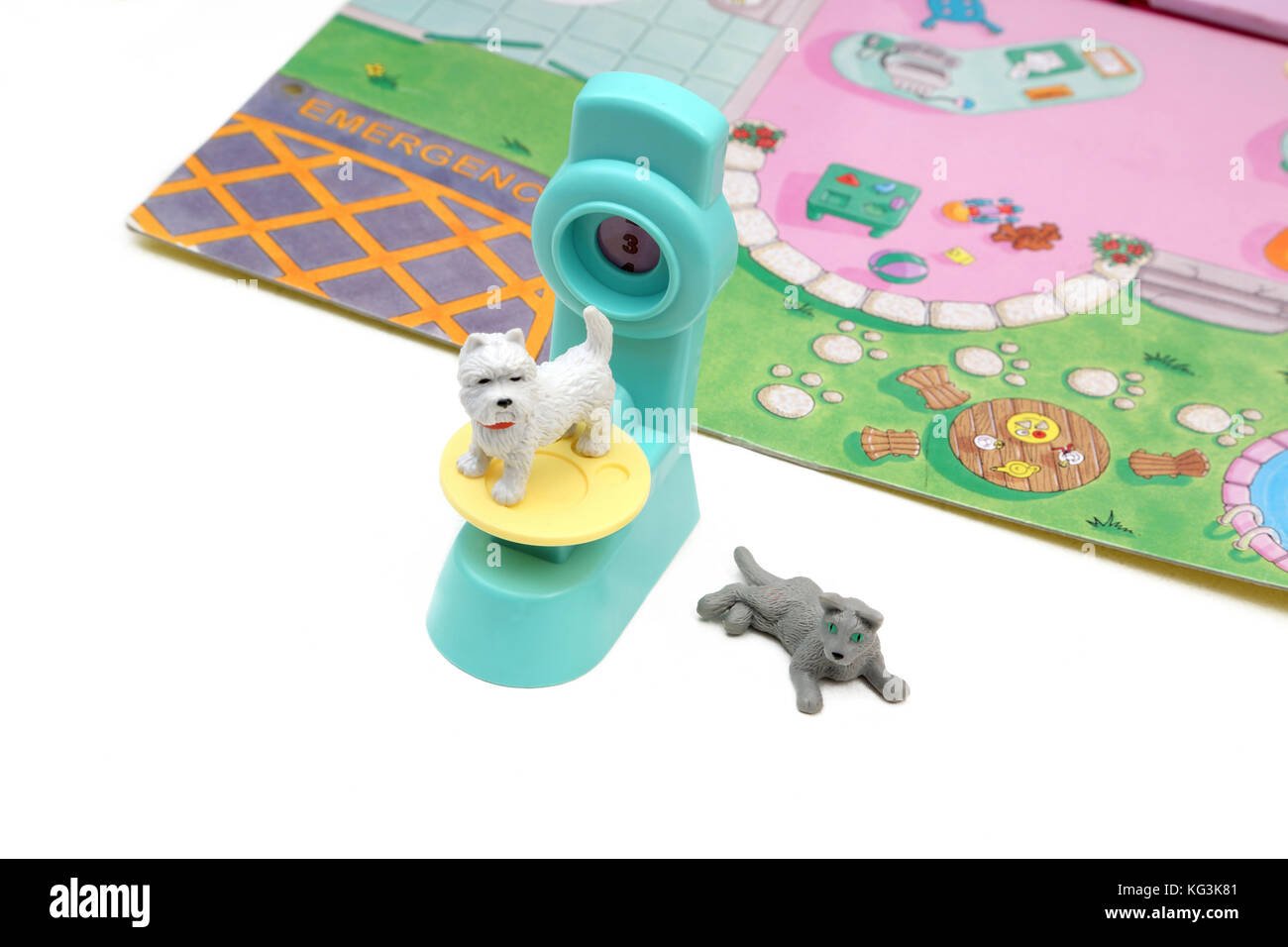 Vintage des années 90, Toy chiot dans ma poche et Kitty dans ma poche avec une balance Banque D'Images