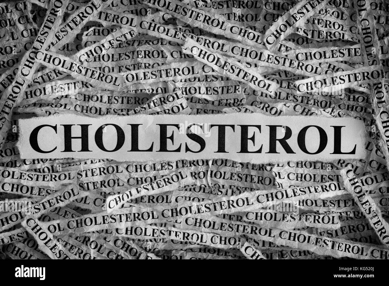 Le cholestérol. morceaux de papier avec word le cholestérol. concept image. noir et blanc. libre. Banque D'Images