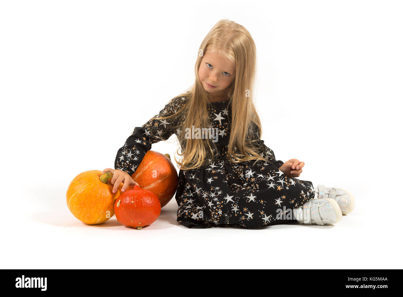 Belle fille mignonne en costume magicien Banque D'Images