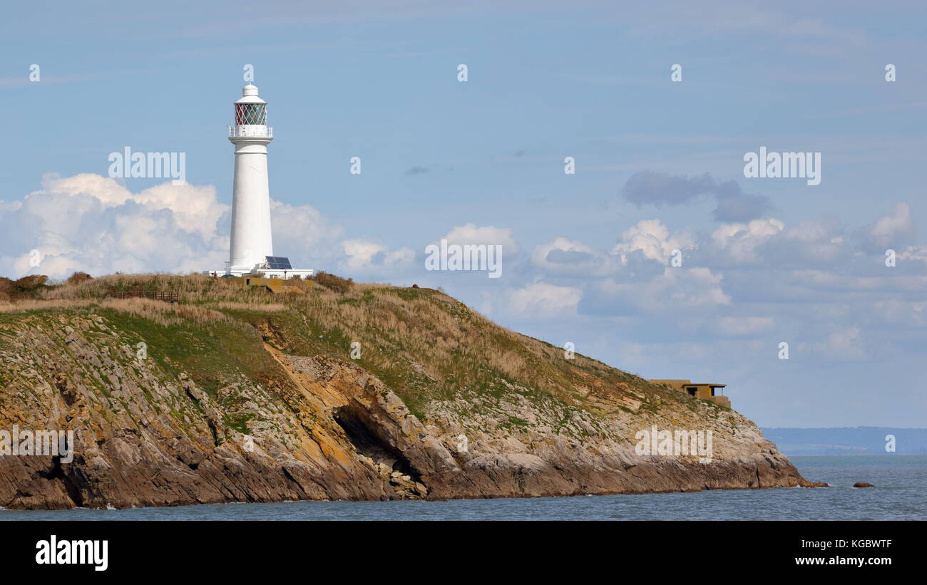 Phare éminents, mâchicoulis et défensif entourant les détails sur l'appartement holm island, dans le cadre de Cardiff au canal de Bristol, Royaume-Uni Banque D'Images