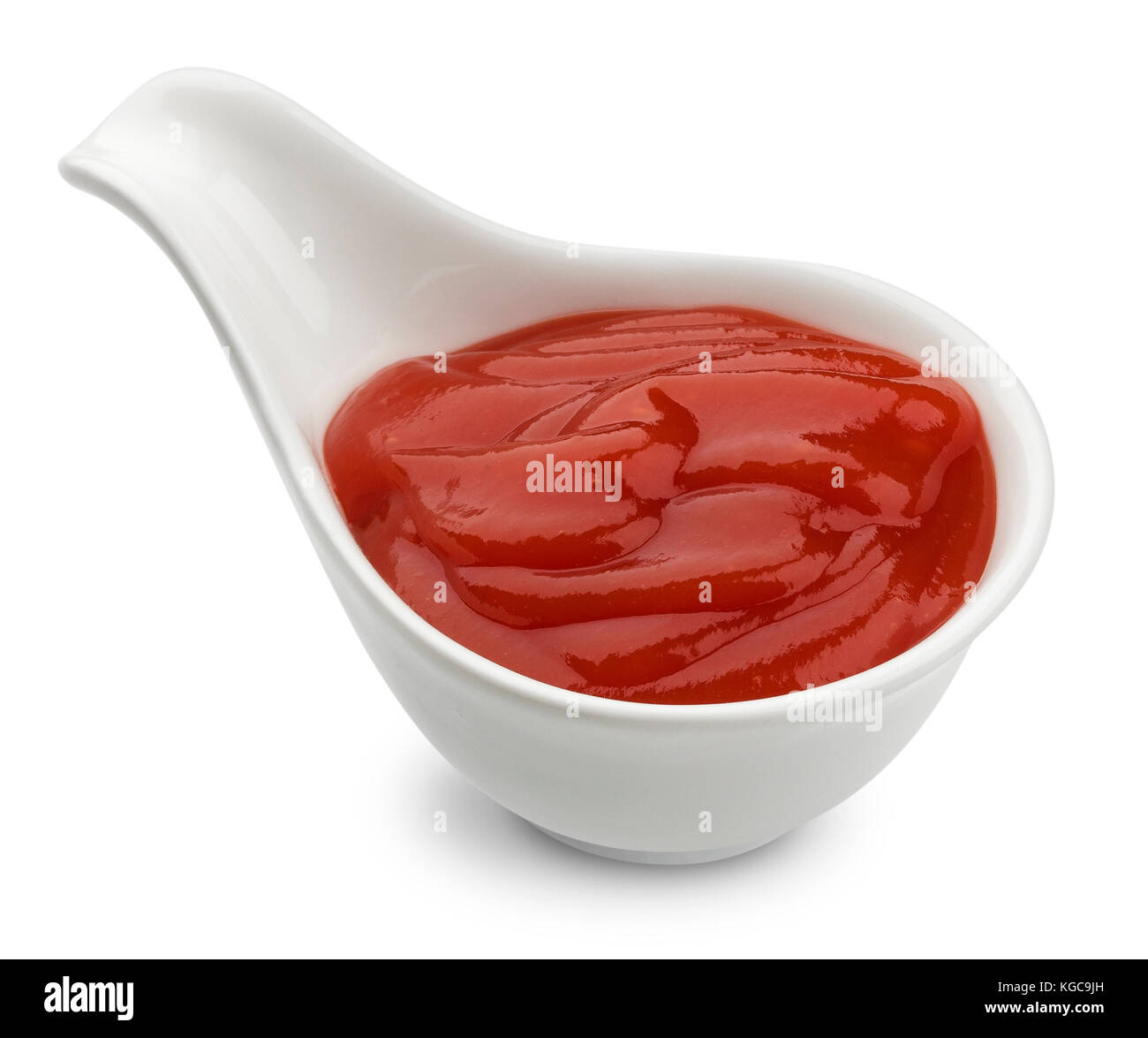 Le ketchup isolé sur fond blanc, de la sauce tomate dans un bol Banque D'Images