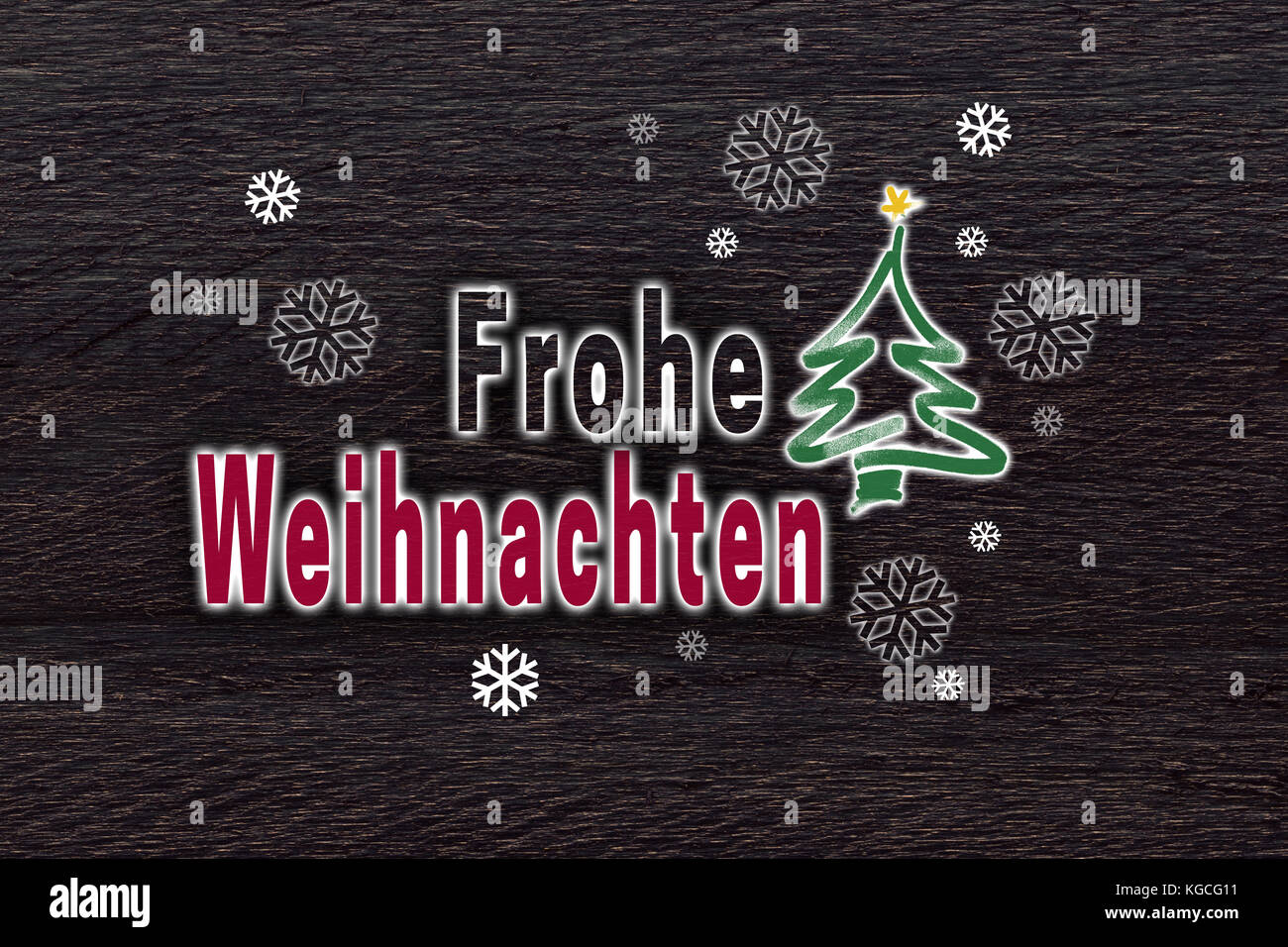 Frohe weihnachten (en allemand joyeux noël) avec des flocons sur brun bois carte de Noël Photo