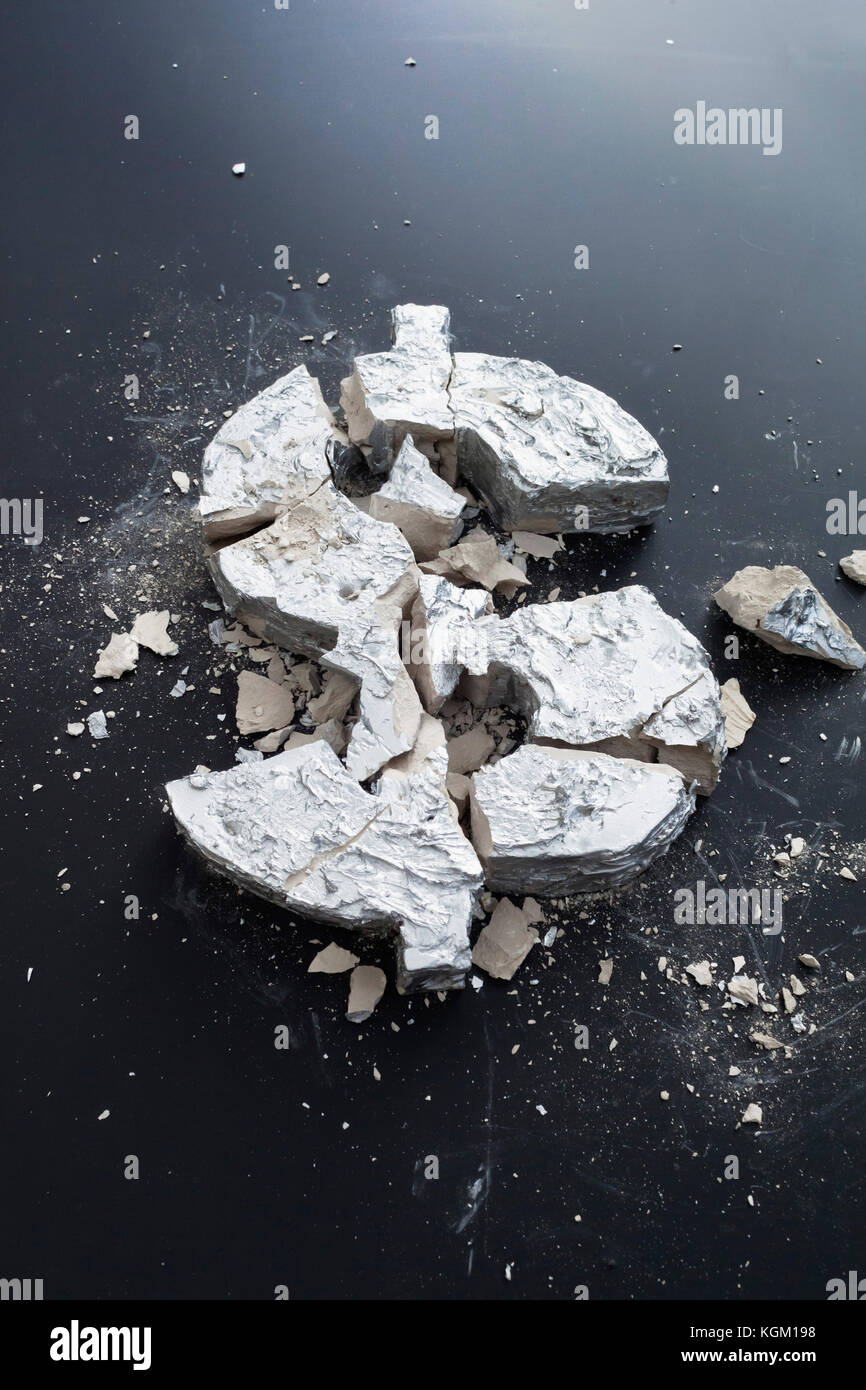 Close-up de béton brisés signe dollar sur la table Banque D'Images