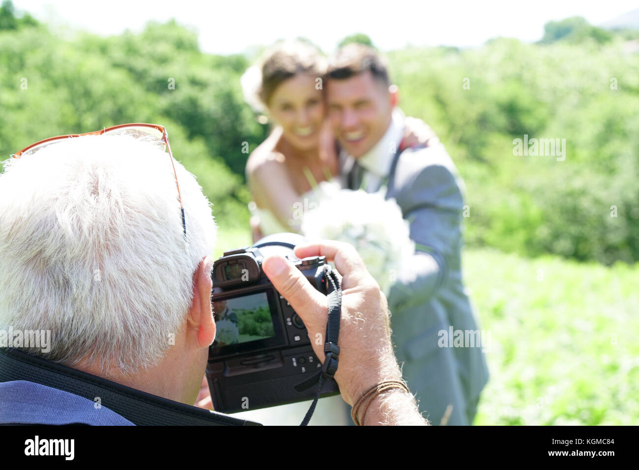 Photos de mariage photographe de mariée et le marié Banque D'Images