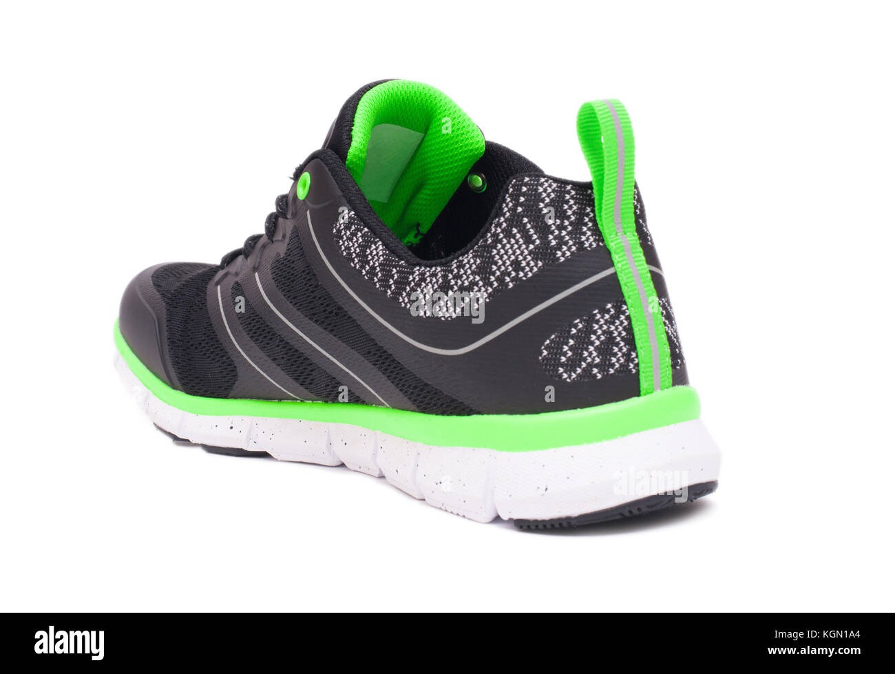 Lime Green et black sport chaussures unisexe isolé sur fond blanc Banque D'Images
