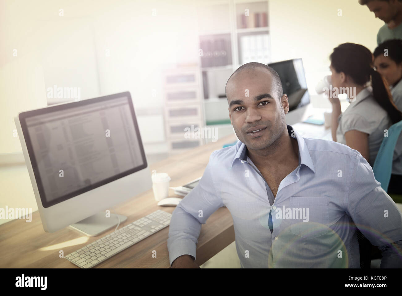 Portrait of young businessman in office Banque D'Images